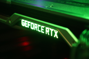 Photograph of GeForce RTX 2080 inside case, with green glow.